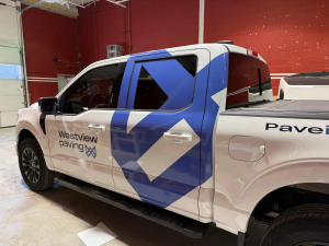 Westview Paving Ford pickup truck Service truck with bold blue geometric design and company logo branding, fleet graphic branding, professional vehicle wraps for paving and construction companies across Southern Ontario including Toronto, Mississauga, Brampton, Oakville, Burlington, Hamilton, Milton, Vaughan, Richmond Hill, Markham, Pickering, Ajax, Whitby, Oshawa, Newmarket, Aurora, Barrie, Guelph, Kitchener, Waterloo, Cambridge, London, Windsor, and Niagara Falls.
