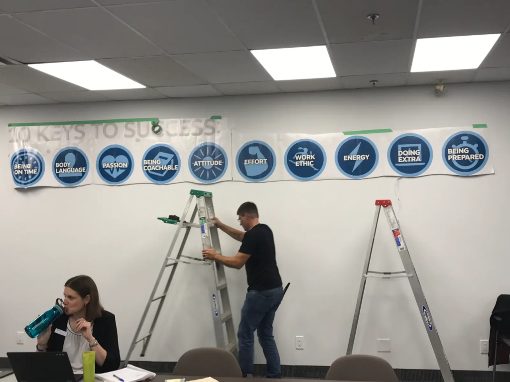 Professional office wall graphic featuring the NPower Canada logo and branding text installed using 3M vinyl by Innovative Sign Solution, serving Toronto, Mississauga, Brampton, Vaughan, Markham, Richmond Hill, Hamilton, Burlington, Oakville, Milton, Guelph, Kitchener, Waterloo, Cambridge, London, Windsor, Niagara Falls, St. Catharines, Barrie, Oshawa, Whitby, Ajax, Pickering, and all other cities across Southern Ontario